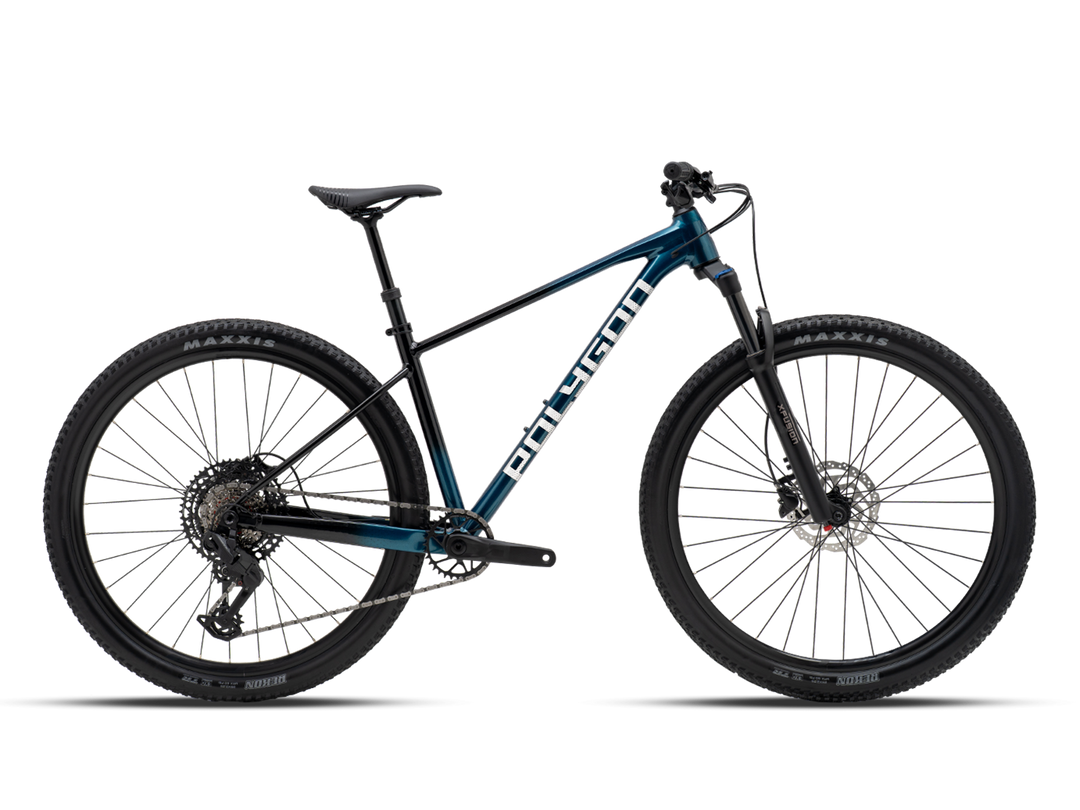 Polygon Xtrada 7 mountain bike in Blue/Black, right-side profile