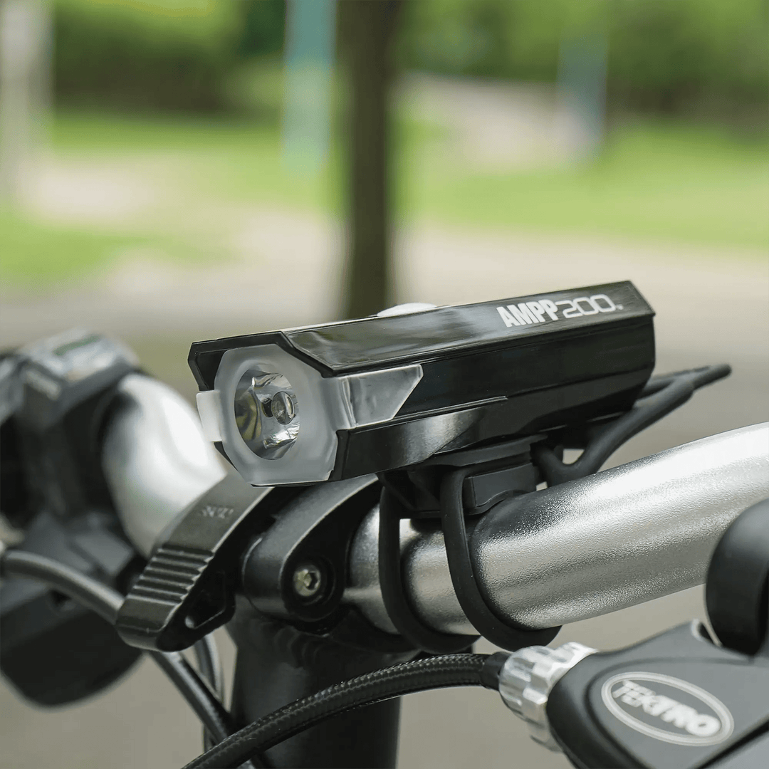 Cateye AMPP200 USB-C front light mounted on a handlebar