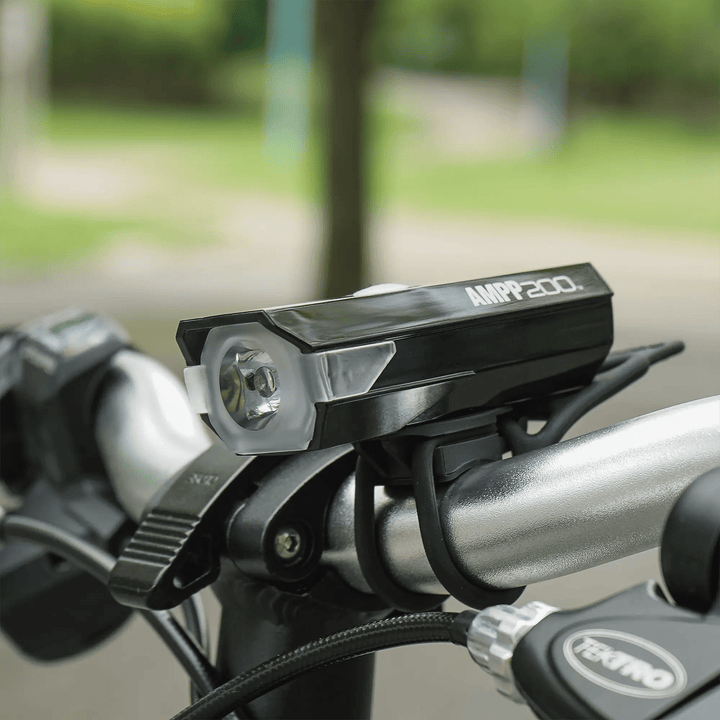 Cateye AMPP200 USB-C front light mounted on a handlebar