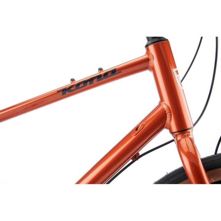 Kona Dew Plus (Orange) - BUMSONTHESADDLE