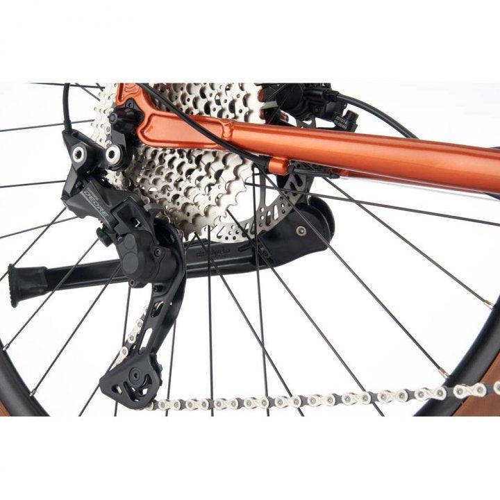 Kona Dew Plus (Orange) - BUMSONTHESADDLE